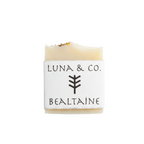 Bar of soap with 'Luna & Co.' branding on a white background