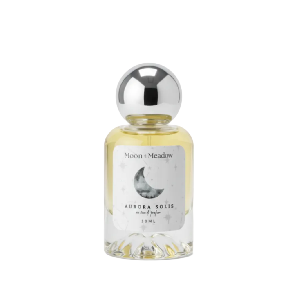 Perfume bottle labeled 'Aurora Solis' by Moon + Meadow on a white background