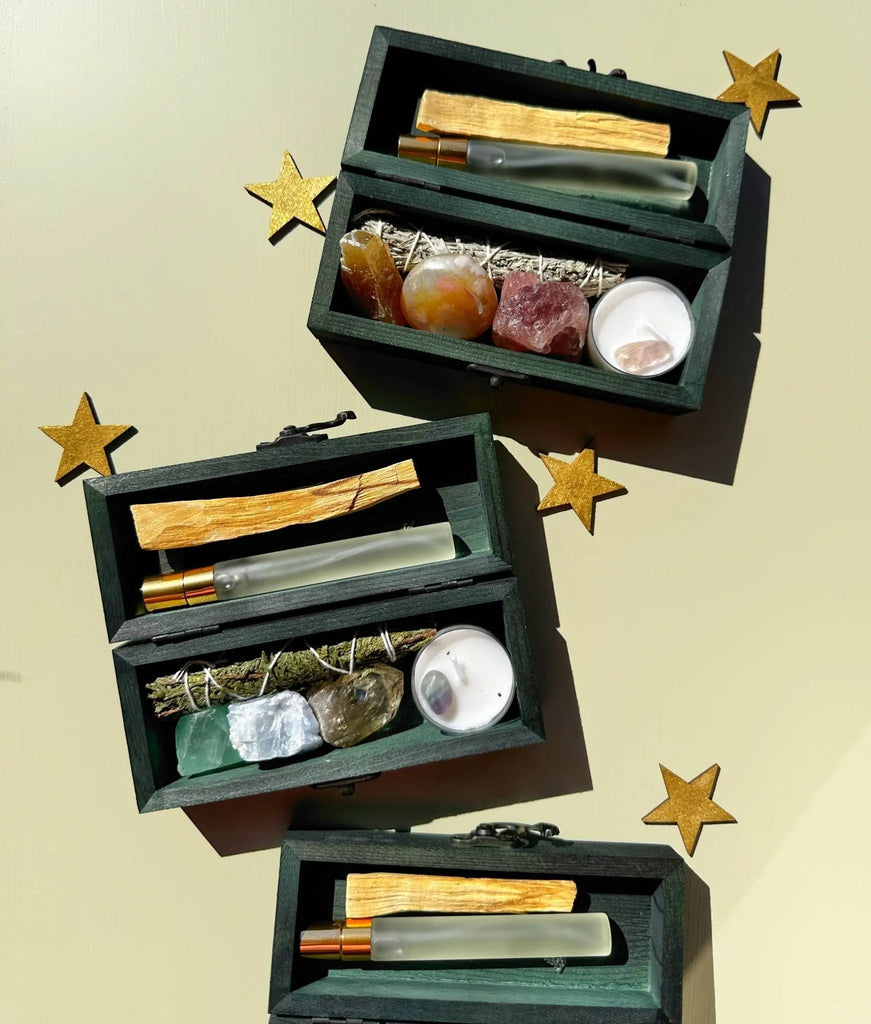 The 12th Moon PROTECTING MY ENERGY KIT includes stress relief crystals, palo santo sticks, spray bottles, and tealight candles—perfect as a VIBING KIT to relieve stress and remove negativity.
